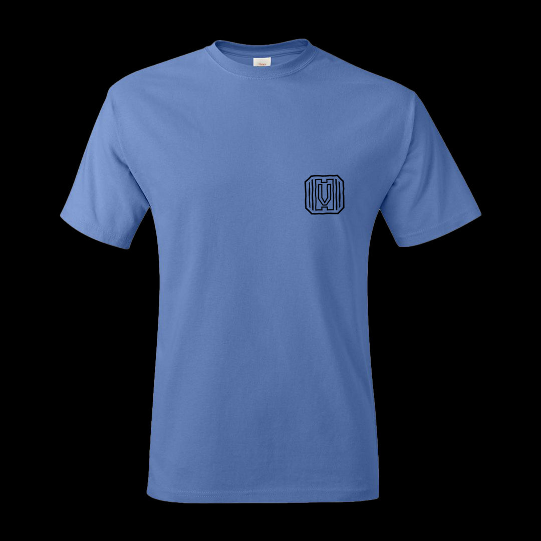 Front side of the Carolina Blue Vindicated Tee Shirt with black Vindicated logo on the left chest